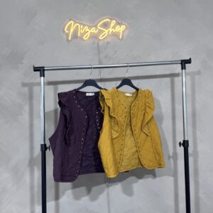 Chaleco acolchado tachas
